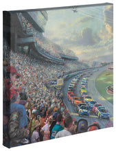 Load image into Gallery viewer, a group of people sitting on top of a train 
