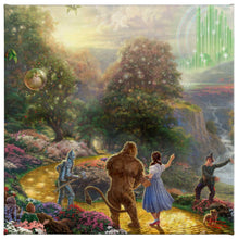 Load image into Gallery viewer, a couple of animals that are standing in the grass 
