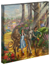 Load image into Gallery viewer, a group of people riding on a horse drawn carriage 
